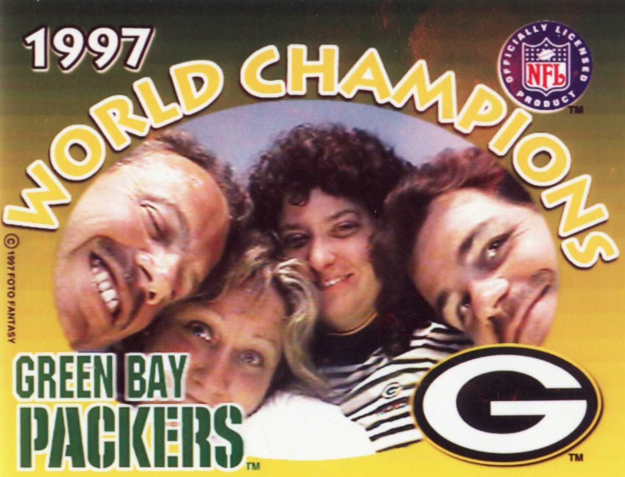 Poster announcing the Green Bay Packers as 1997 World Champions, featuring a group photo of smiling players and the Packers logo.