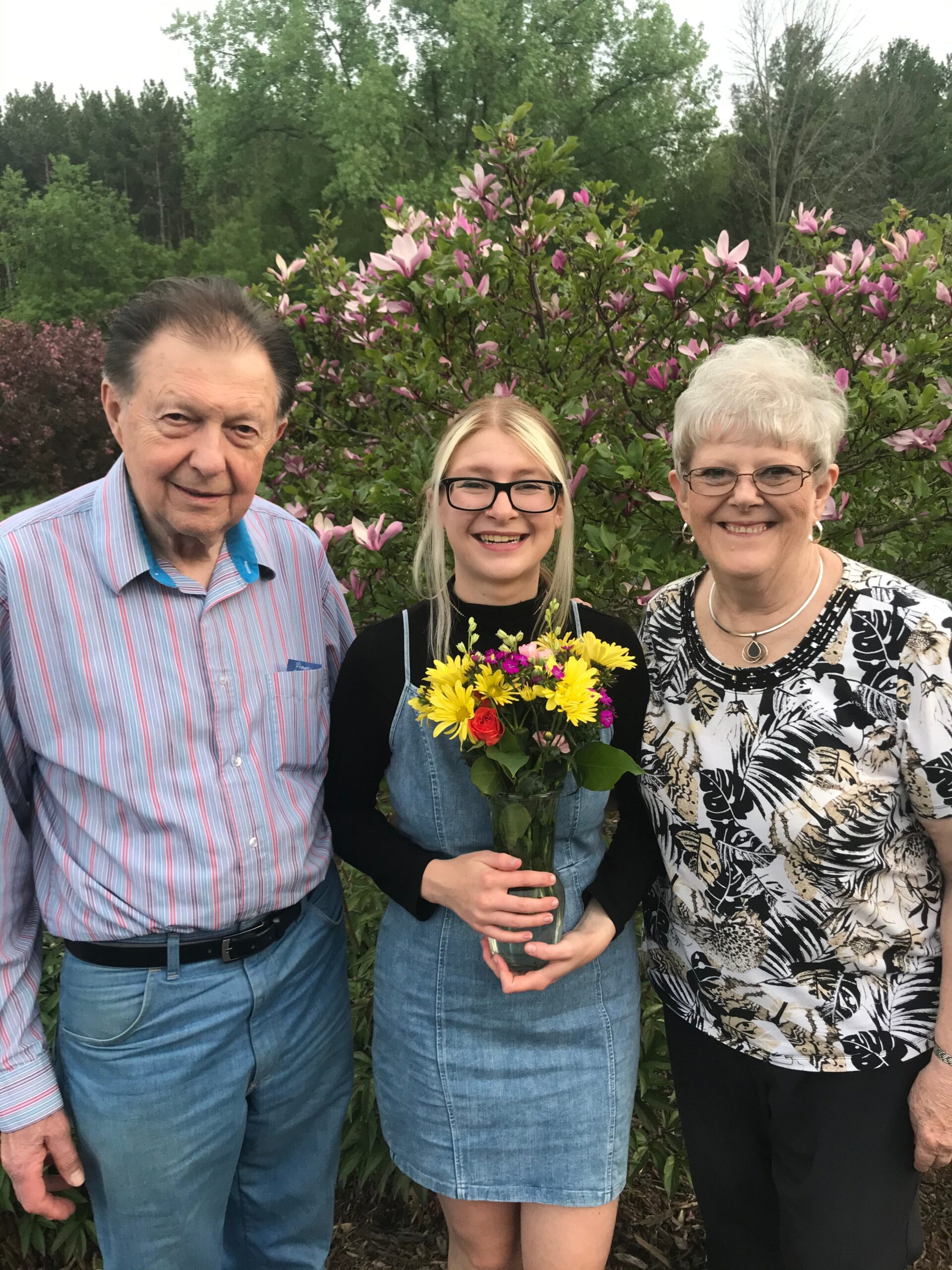 Three generations posing outdoors in front of flowering bushes; young woman holds a bouquet of yellow flowers and pink accents.','Center: a young woman in a denim dress with glasses, flanked by an older man and an older woman, smiling in a garden.','Family photo in a garden with pink magnolia-like blossoms behind them.','A smiling trio—an older man, a young woman with a bouquet, and an older woman—standing in front of flowering shrubs.','Group portrait outdoors by pink flowering bushes, the center person holding a colorful bouquet.'] } } } } } } } } } } } } } } } } } } } } } } } } } } } } } } } } } } } } } } } } } } } } } } } } } } } } } } } } } } } } } } } } } } } } } } } } } } } } } } } } } } } } } } } } } } } } } } } } } } } } } } } } } } } } } } } } } } } } } } } } } } } } } } } } } } } } } } } } } } } } } } } } } } } } } } } } } } } } } } } } } } } } } } } } } } } } } } } } } } } } } } } } } } } } } } } } } } } } } } } } } } } } } } } } } } } } } } } } } } } } } } } } } } } } } } } } } } } } } } } } } } } } } } } } } } } } } } } } } } } } } } } } } } } } } } } } } } } } } } } } } } } } } } } } } } } } } } } } } } } } } } } } } } } } } } } } } } } } } } } } } } } } } } } } } } } } } } } } } } } } } } } } } } } } } } } } } } } } } } } } } } } } } } } } } } } } } } } } } } } (Note: The tool trimmed characters; actual ALT text array contains properly formatted strings.) } } } } } } } } } } } } } } } } } } } } } } } } } } } } } } } } } } } } } } } } } } } } } } } } } } } } } } } } } } } } } } } } } } } } } } } } } } } } } } } } } } } } } } } } } } } } } } } } } } } } } } } } } } } } } } } } } } } } } } } } } } } } } } } } } } } } } } } } } } } } } } } } } } } } } } } } } } } } } } } } } } } } } } } } } } } } } } } } } } } } } } } } } } } } } } } } } } } } } }} } } } } } } } } } } } } } } } } } } } } } } } } } } } } } } } } } } } } } } } } } } } } } } } } } } } } } } } } } } }}