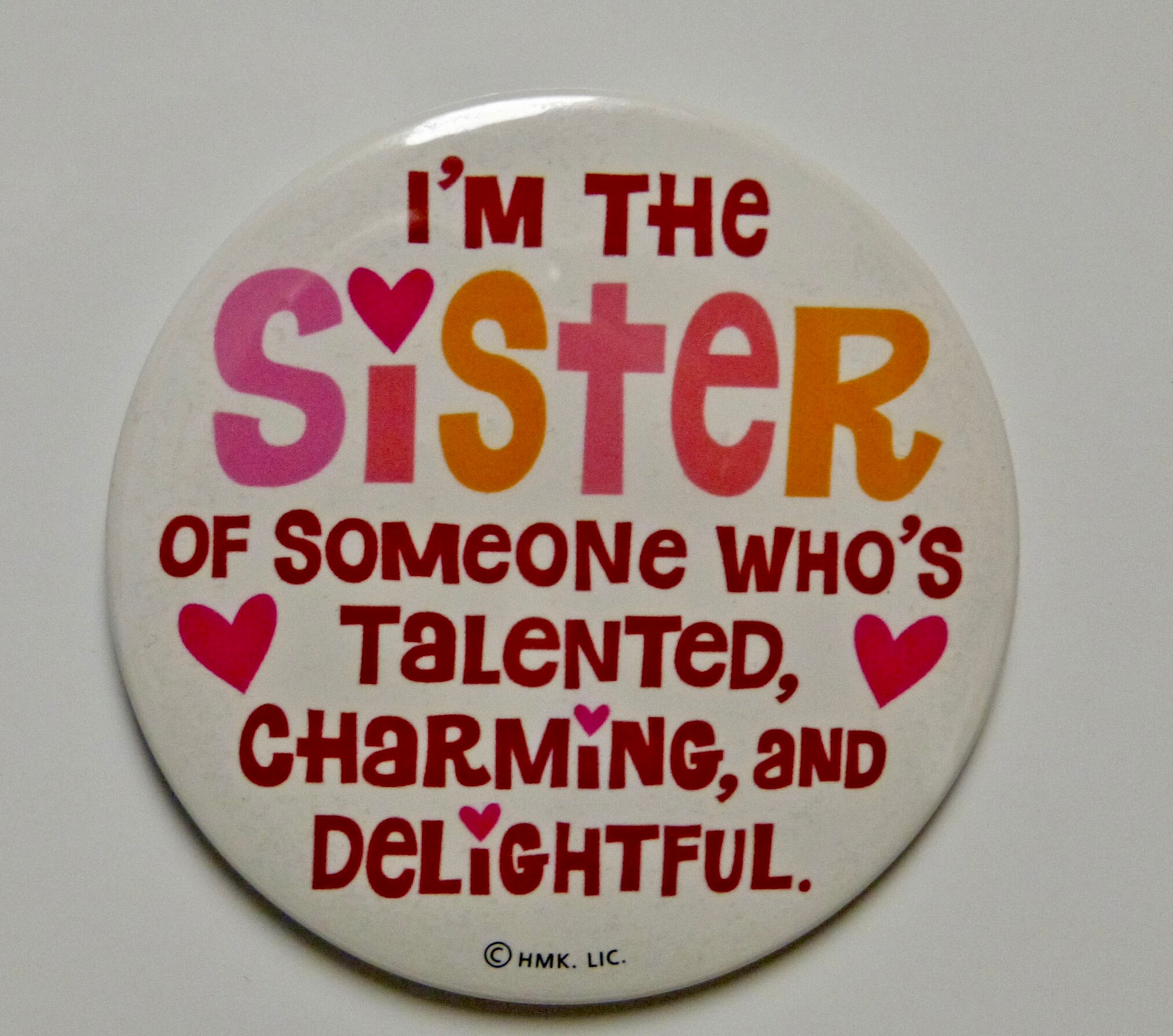 Round badge saying 