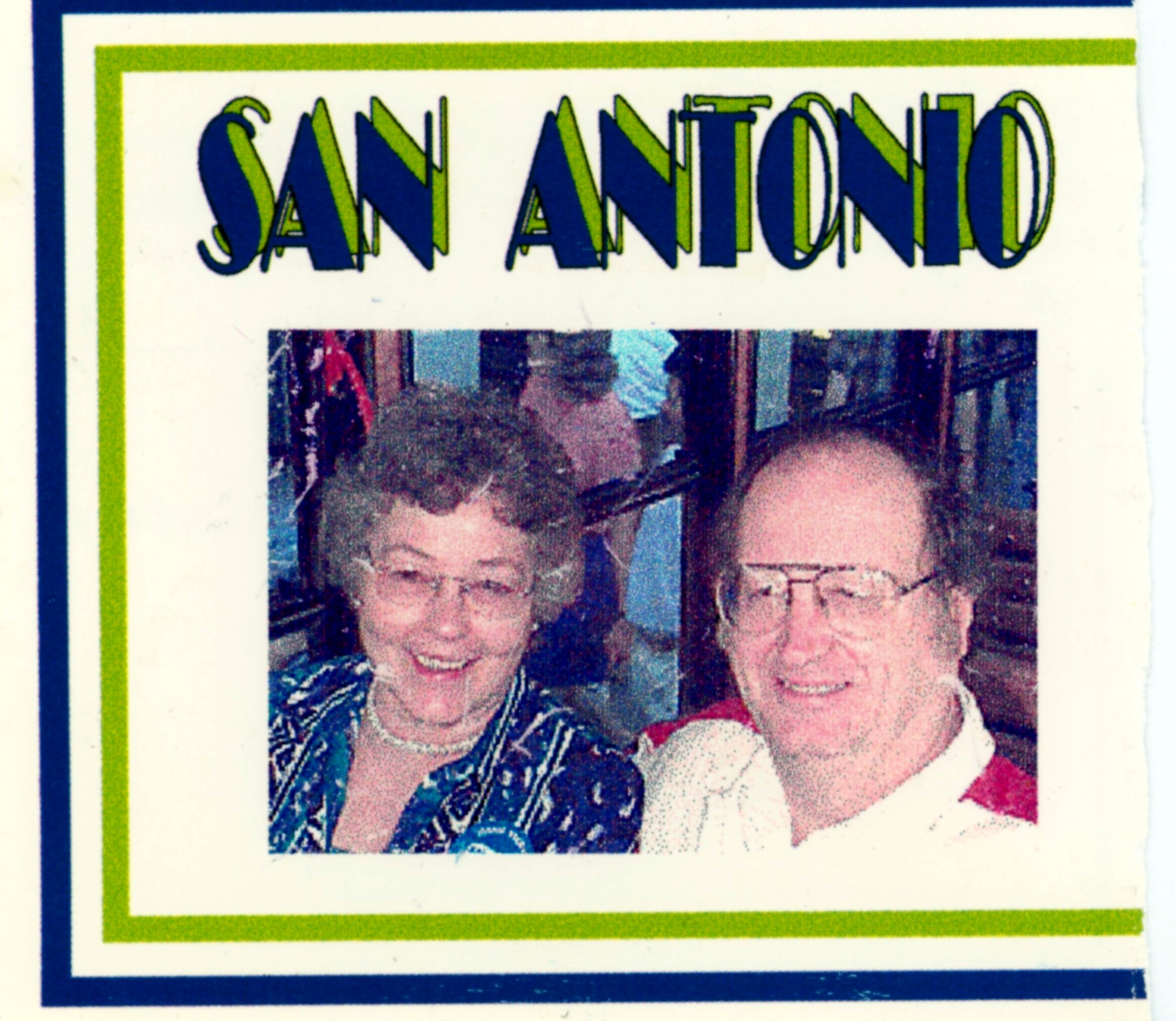 Two people smiling for a photo, framed by blue and lime borders with the word 'SAN ANTONIO' at the top.