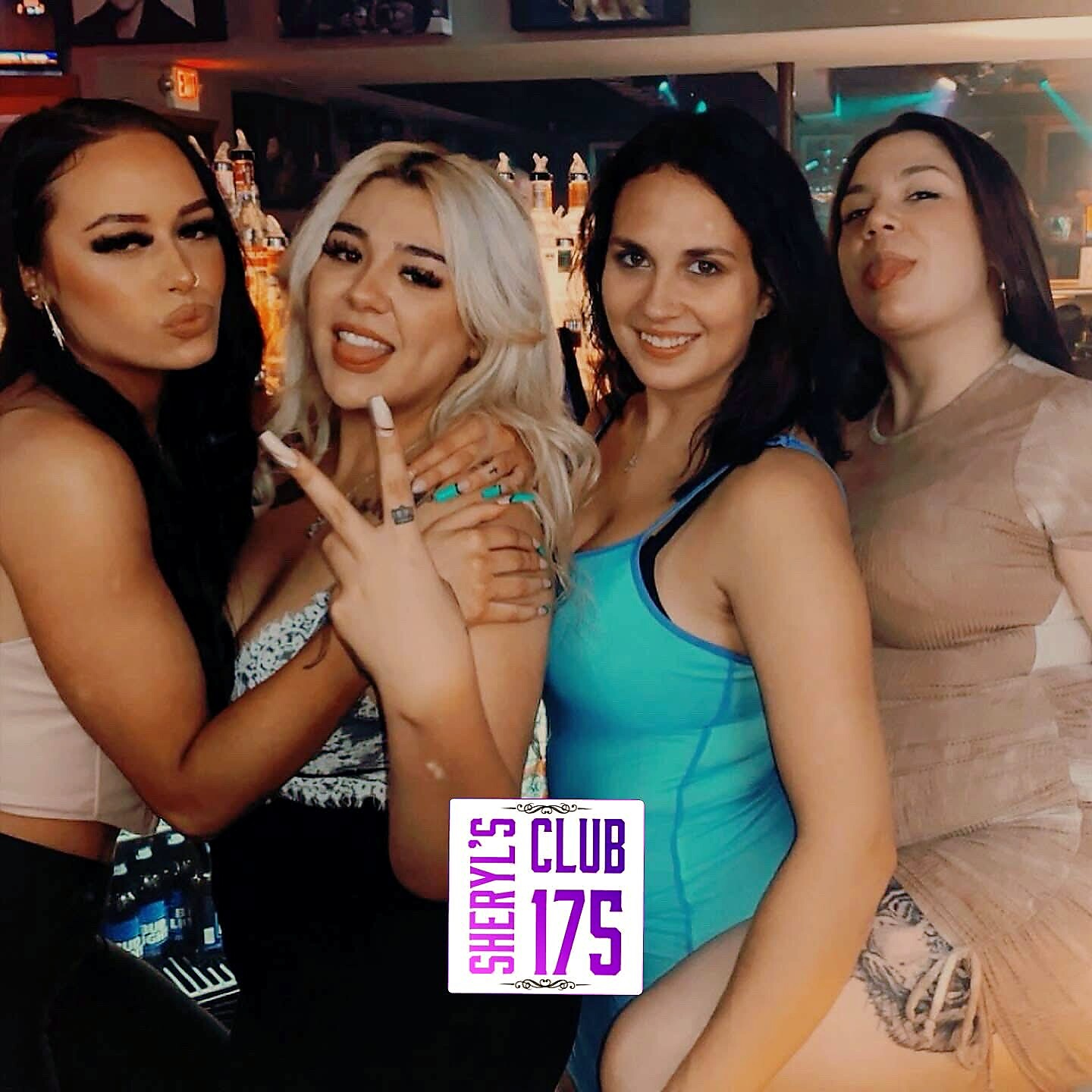 Four friends posing in a nightclub, smiling and sticking out tongues; one with platinum blonde hair, others with dark hair, wearing colorful outfits. A purple 'SHERYL'S CLUB 175' sticker is at the bottom.